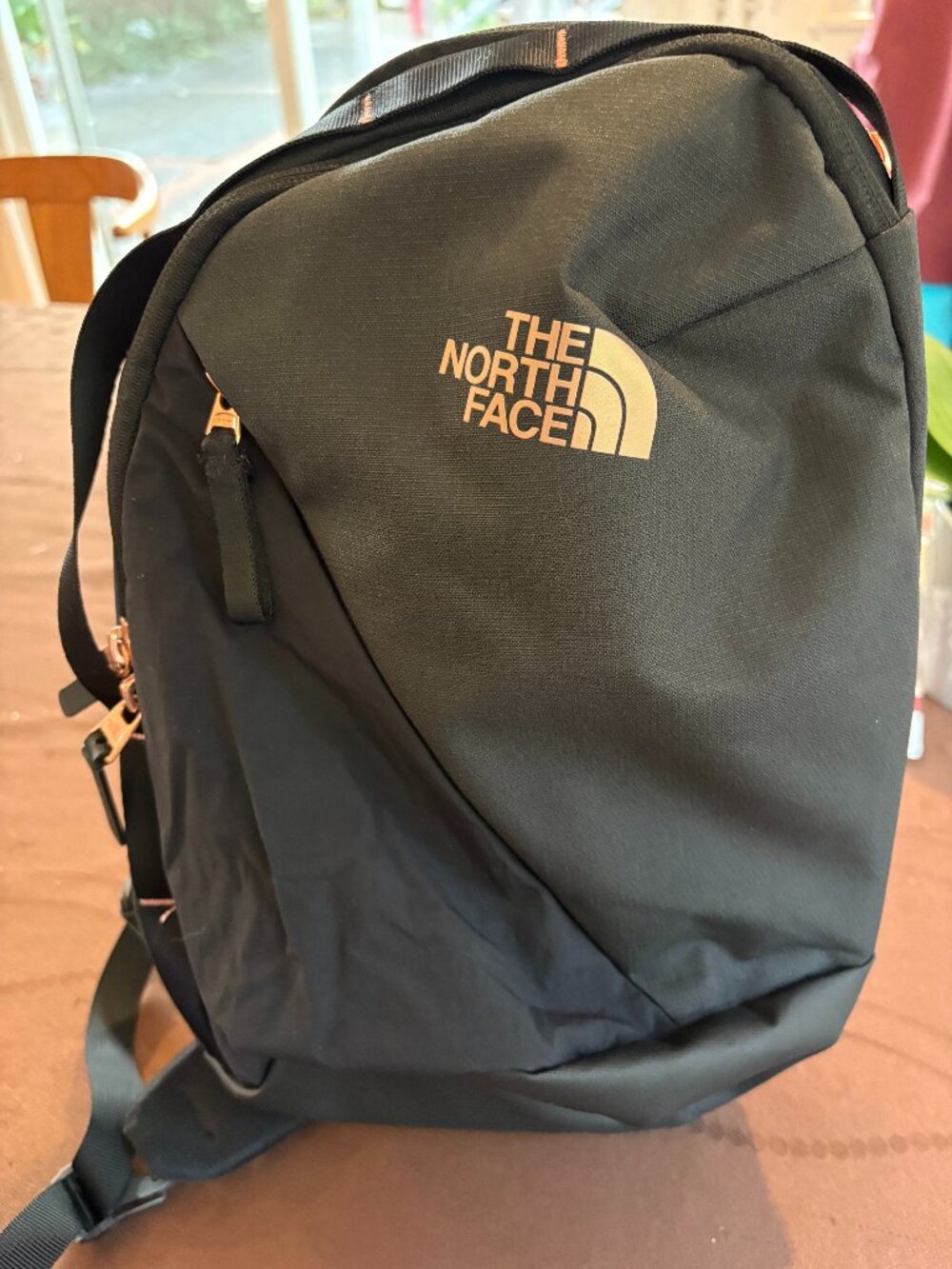 The North Face Isabella Sling Bag in Black/Rose Gold